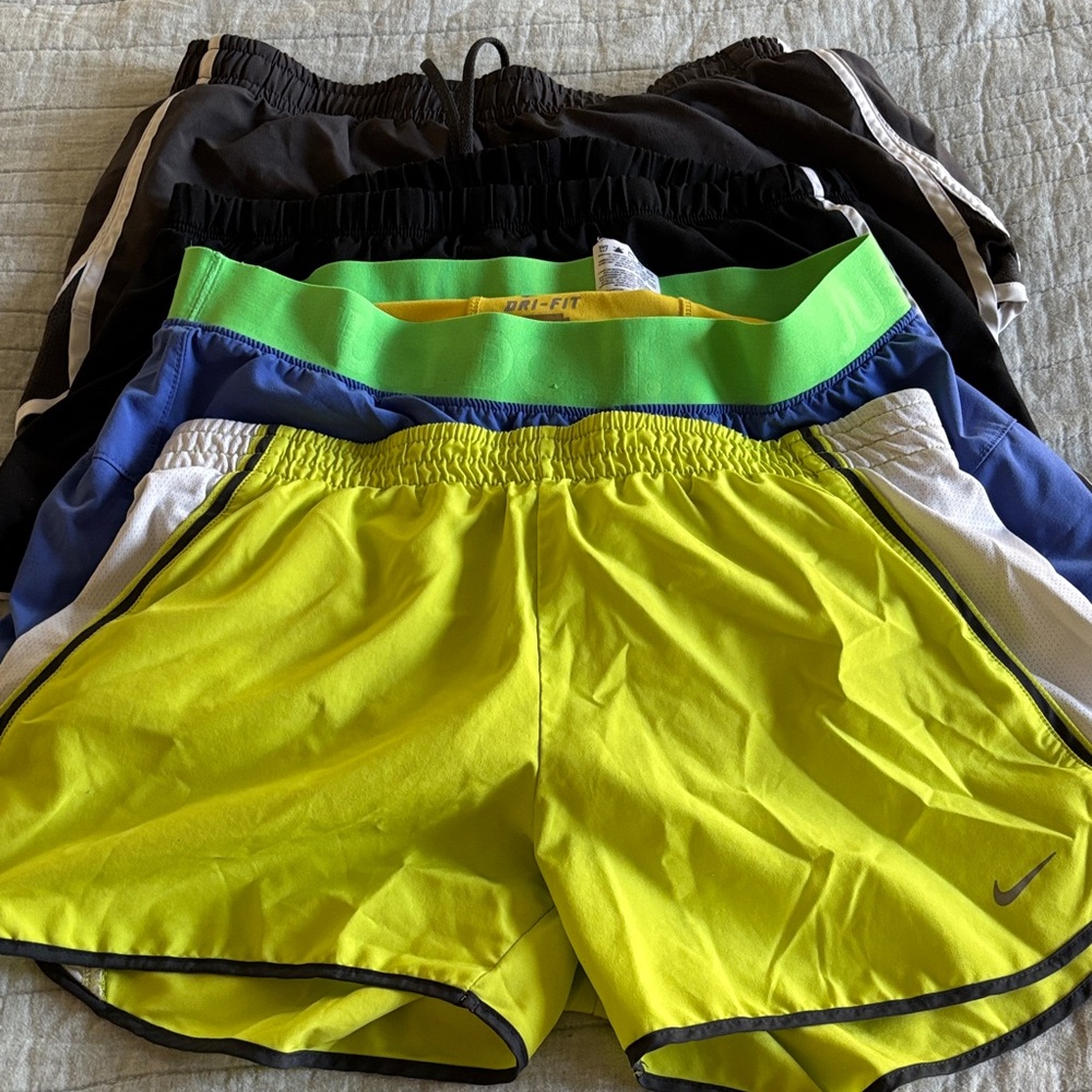 Nike Dri-FIT, UA, New Balance Shorts lot of 4  in Yellow, Blue, and Black